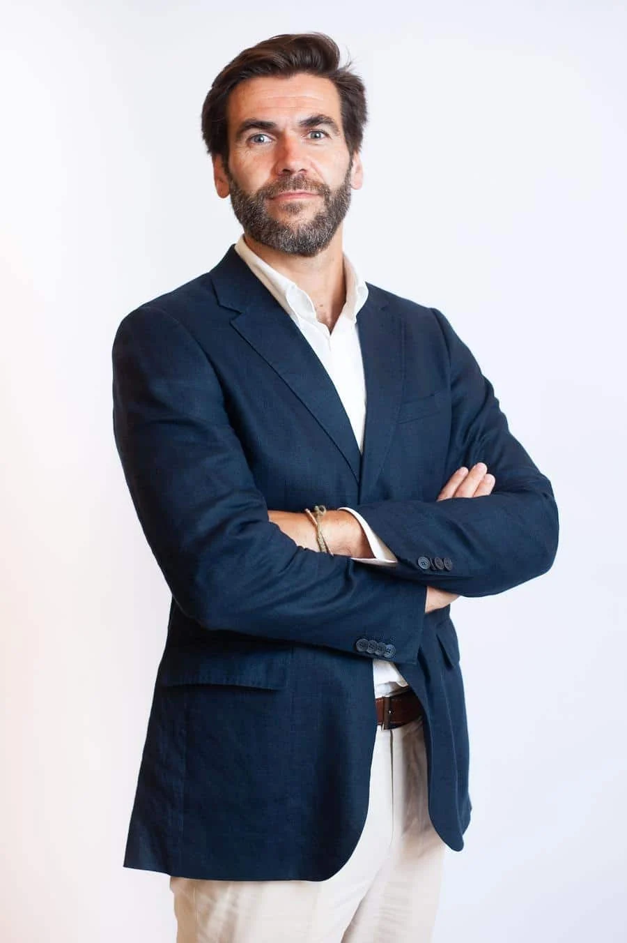 brands business and corporate photography -18 | Pacific Photography Professional man in a navy blazer with white shirt, arms crossed, posing for a corporate portrait
